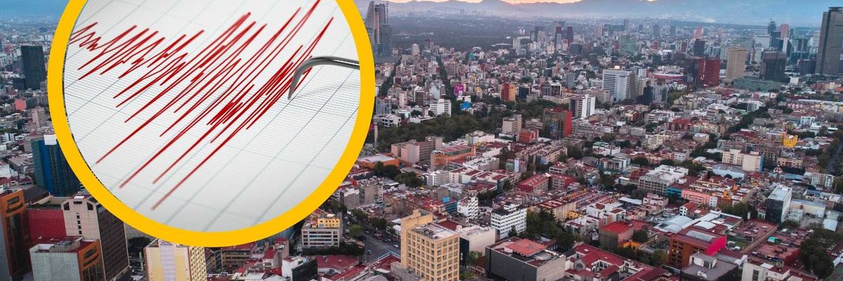Aerial city view with an earthquake seismograph overlay; sunset in the background.