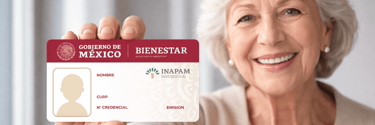 Elderly woman smiling, holding a Mexican INAPAM ID card.