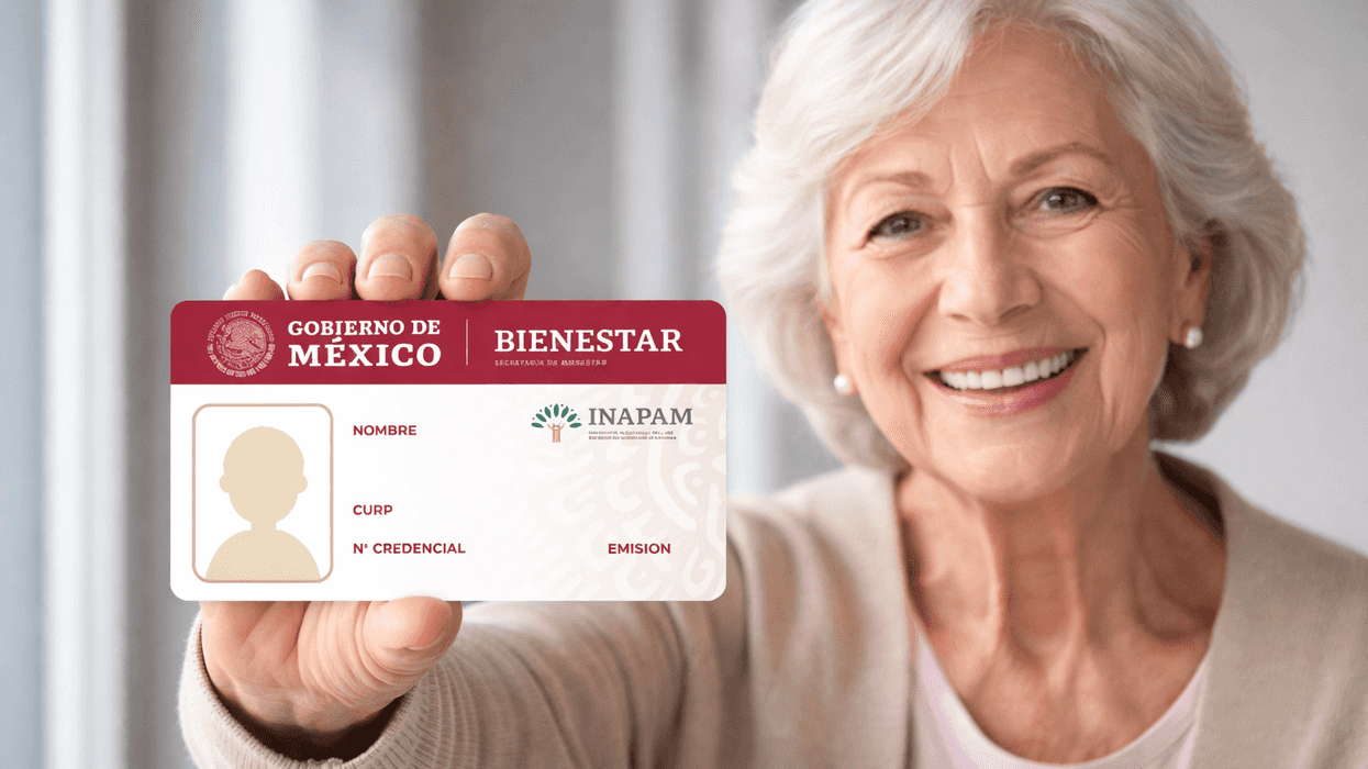 Elderly woman smiling, holding a Mexican INAPAM ID card.