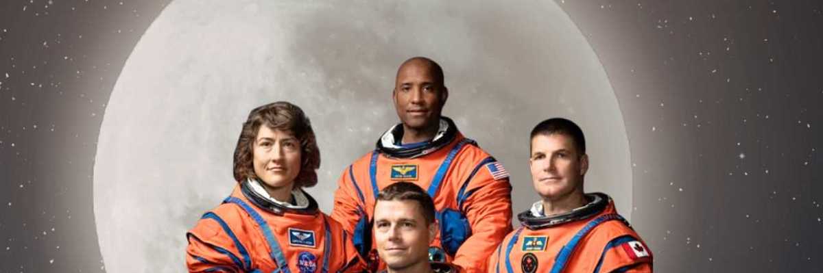 Four astronauts in orange suits with the moon and stars in the background.