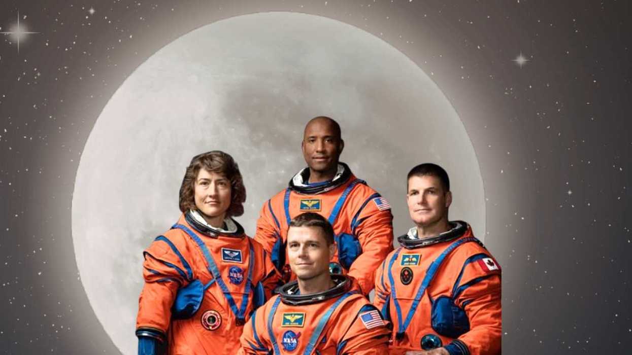 Four astronauts in orange suits with the moon and stars in the background.