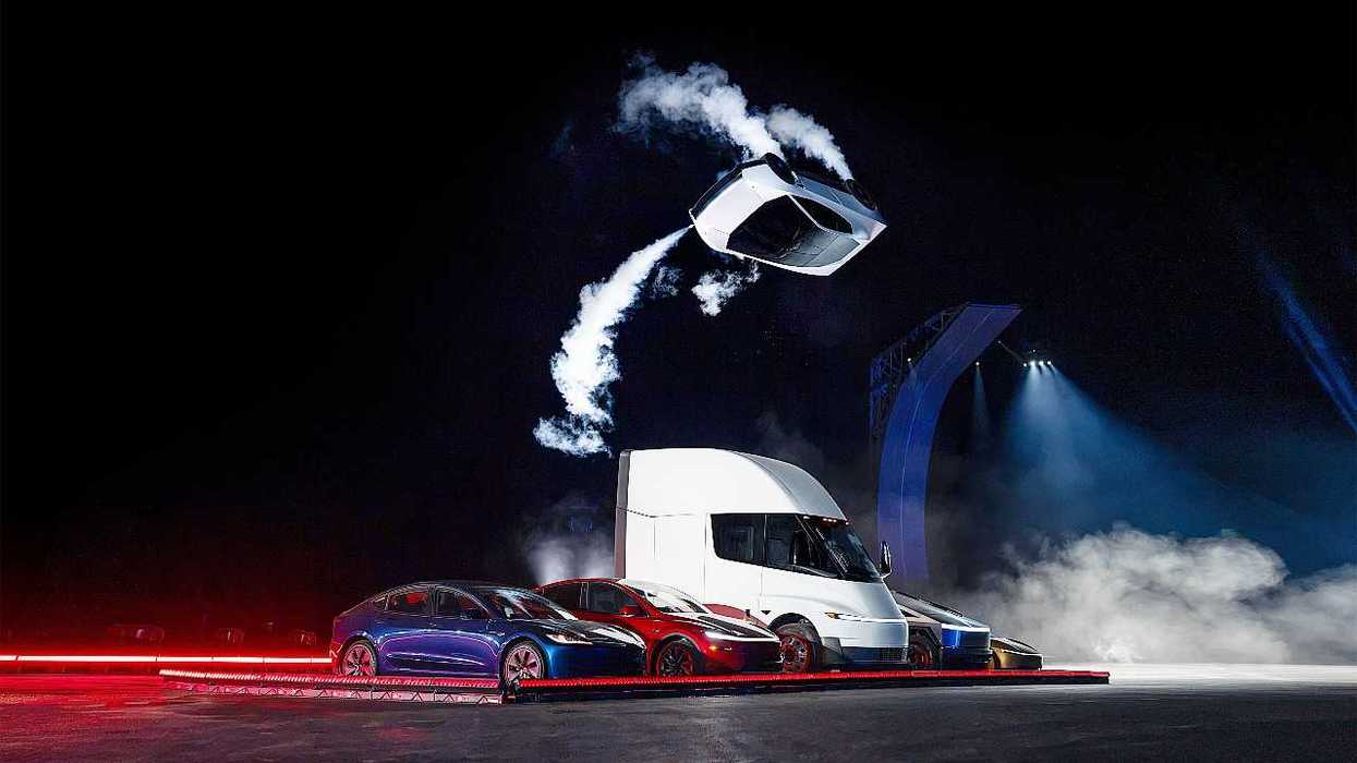 Futuristic scene: flying car above electric vehicles, against smoky, dark backdrop.