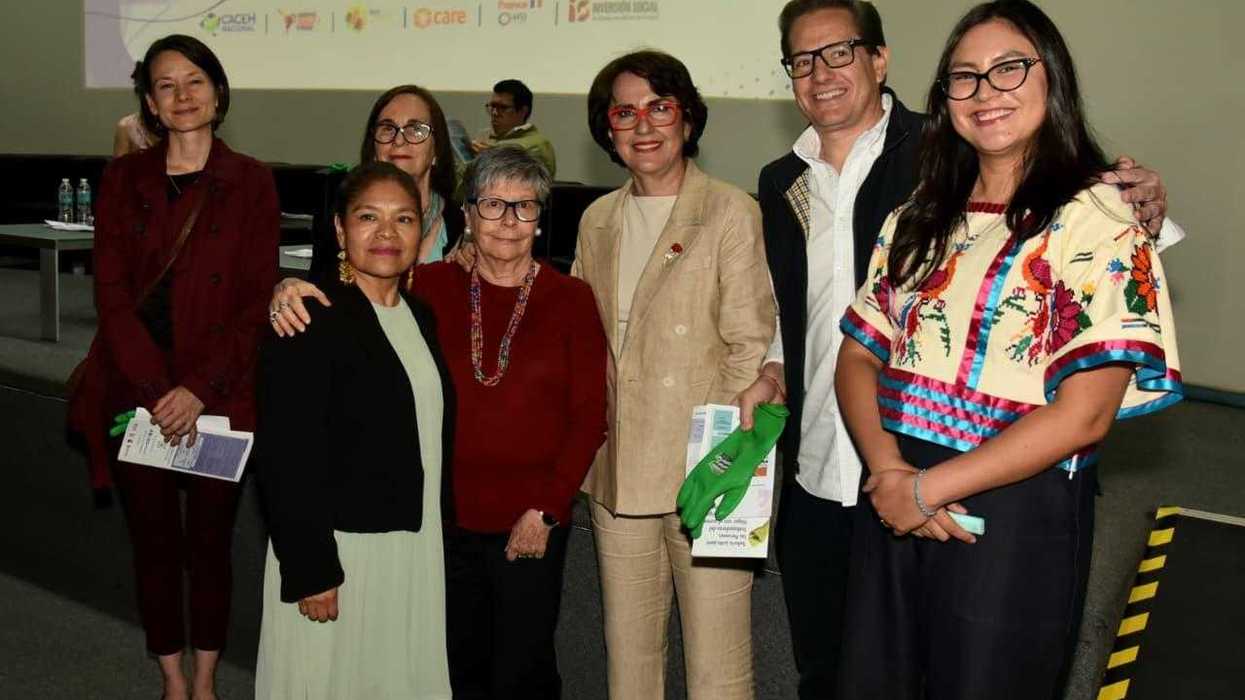 Group of people at an event for domestic work culture.