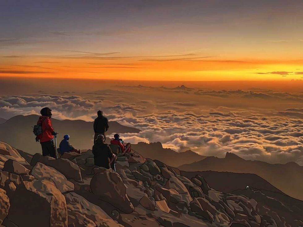 Hikers sitting on a rocky summit, watching a vibrant sunset over a cloud-filled valley.