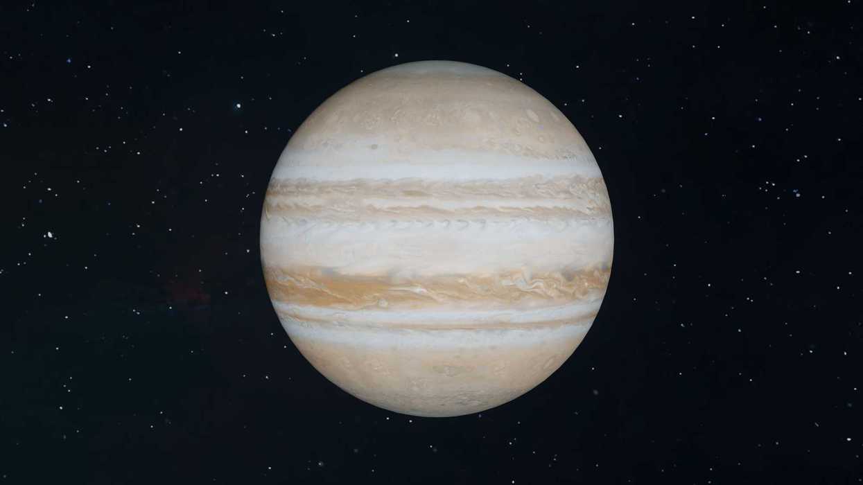 Jupiter with its swirling cloud bands against a starry background.