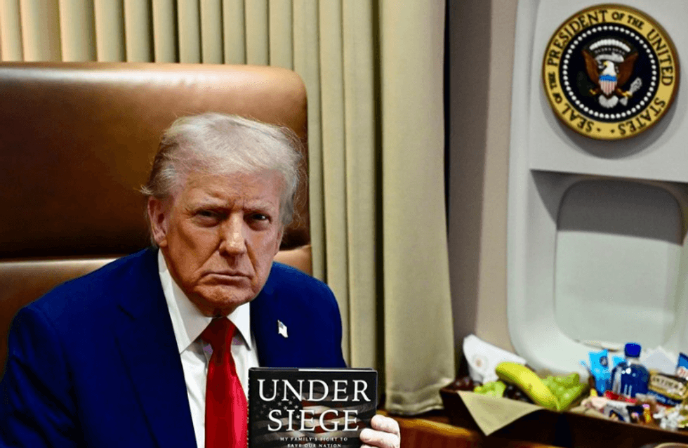 Man holding "Under Siege" book seated near airplane window with presidential seal above.