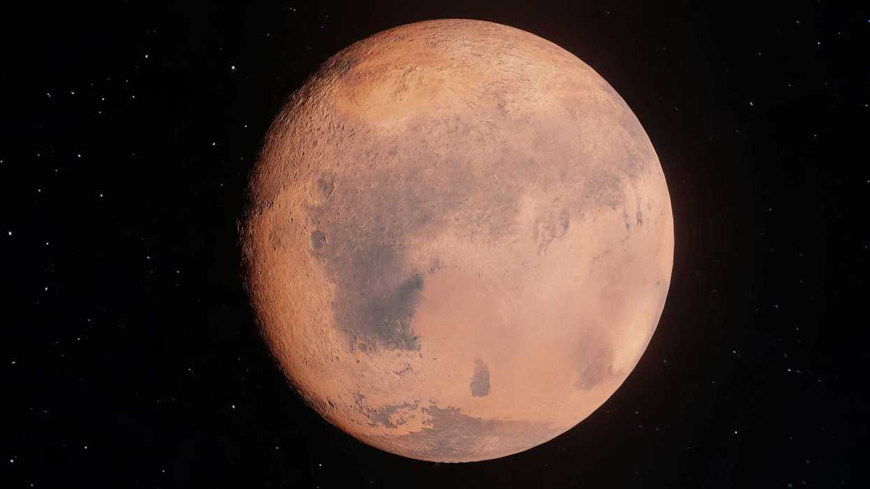 Mars against a starry backdrop, showing craters and red surface details.