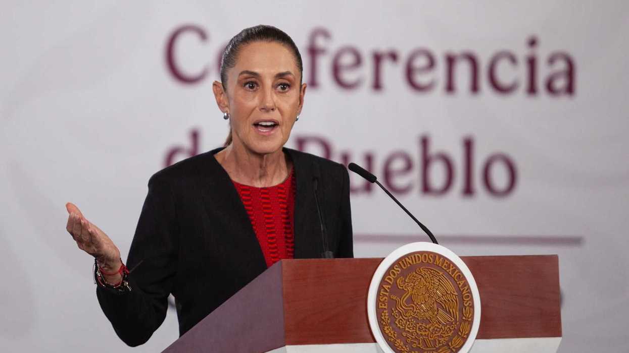Person speaking at a podium with Mexican seal, banner text partially visible.