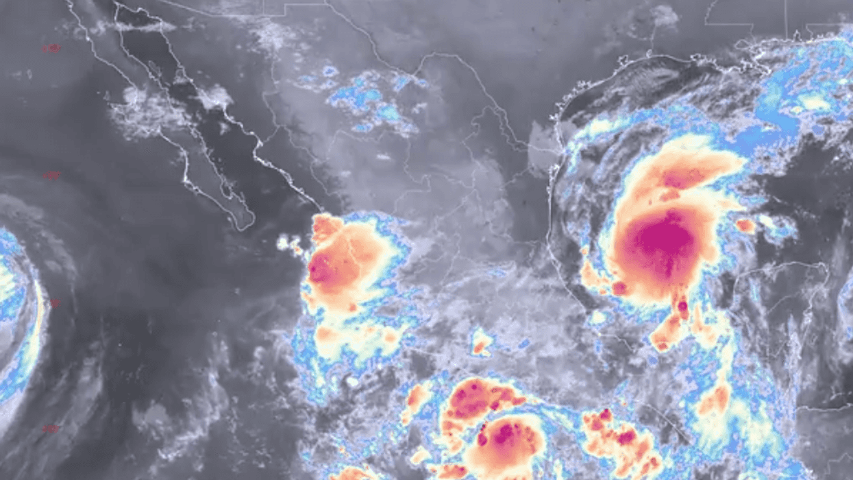 Satellite image of storm systems over Mexico with colorful cloud formations.