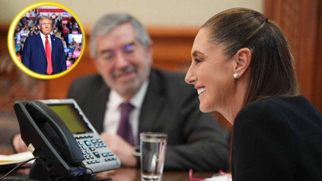 Smiling woman at a meeting table with a phone, man in background, inset of a man at an event.