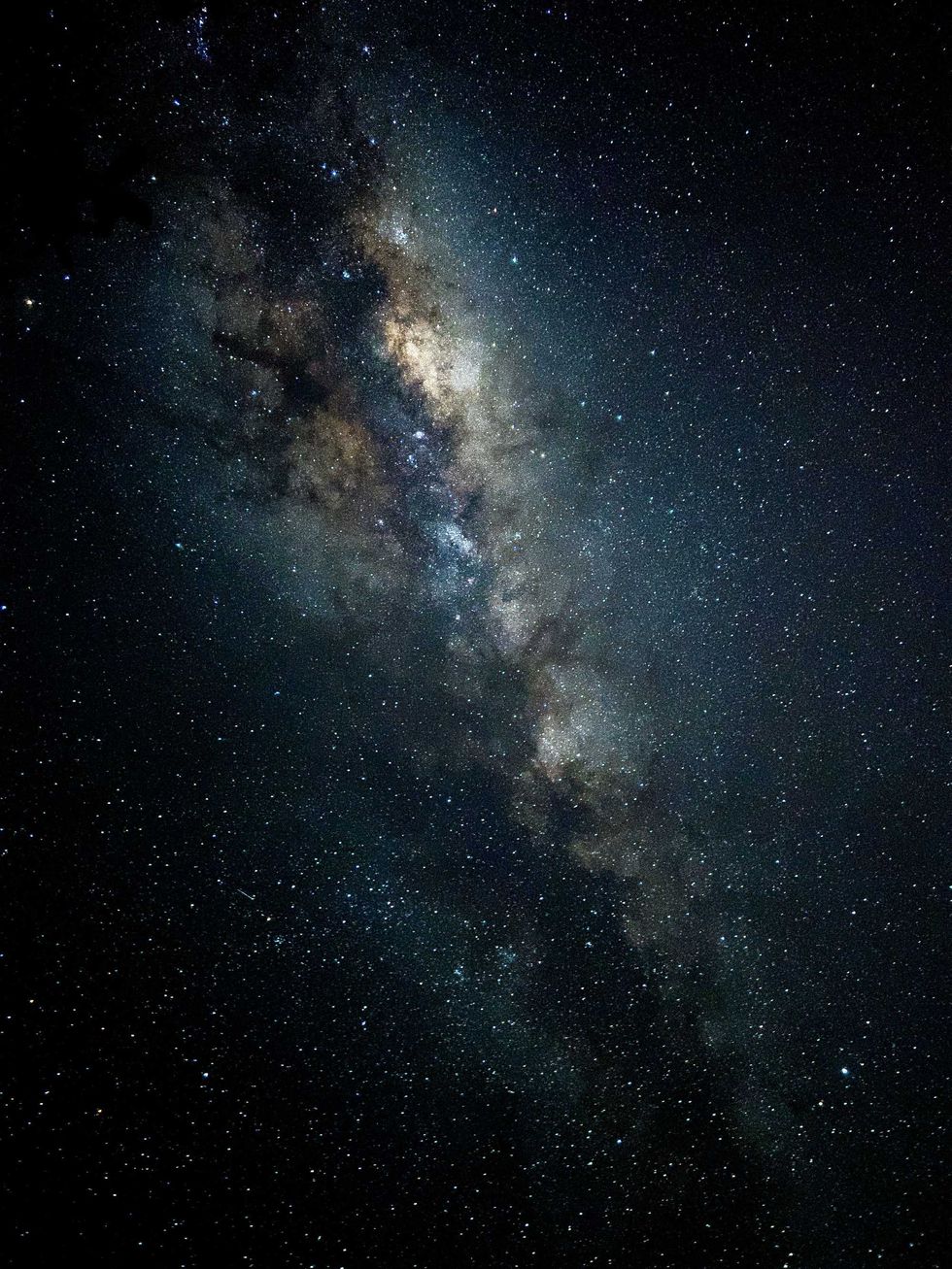The Milky Way galaxy with stars shining in a dark night sky.