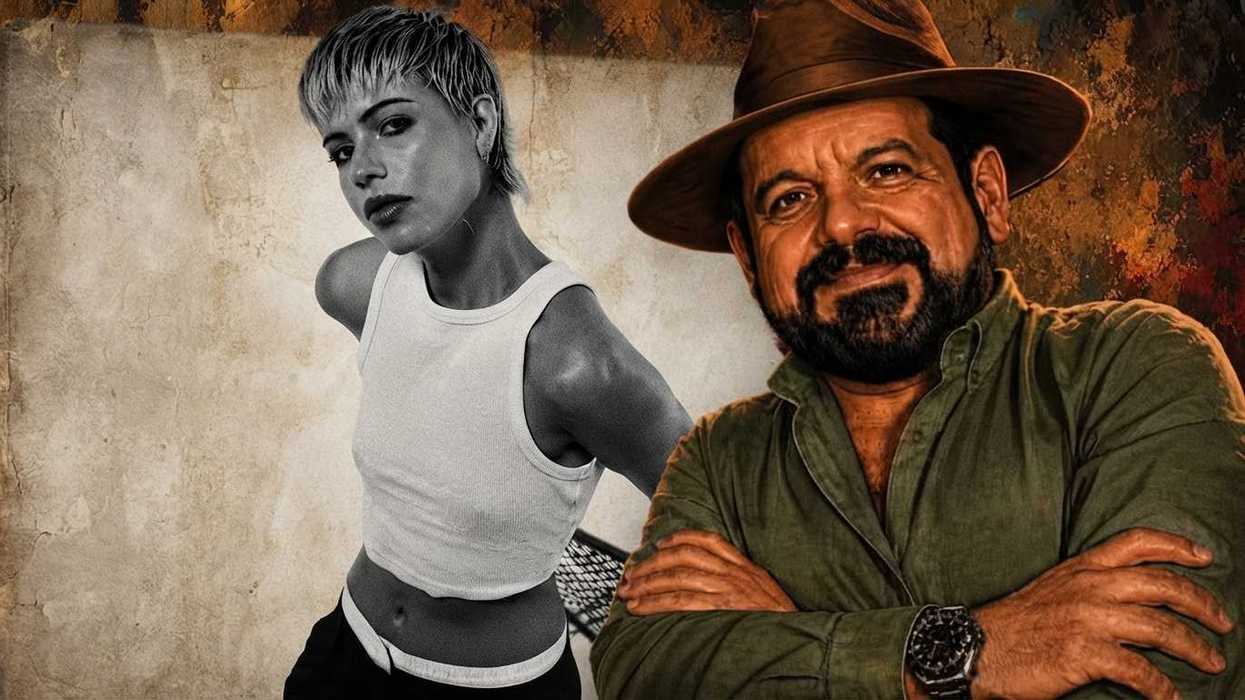 Two individuals; one in a cropped tank top, the other in a hat with arms crossed.
