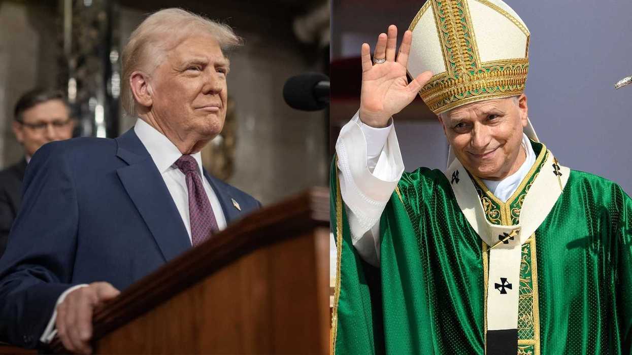 Two men, one in a suit, the other in green religious attire, side by side.