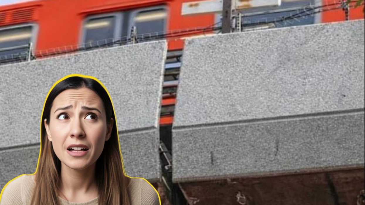 Woman looking worried next to broken elevated train track with train above.
