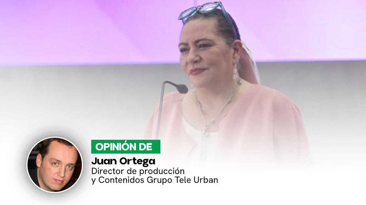 Woman speaking at a podium, opinion piece by Juan Ortega.