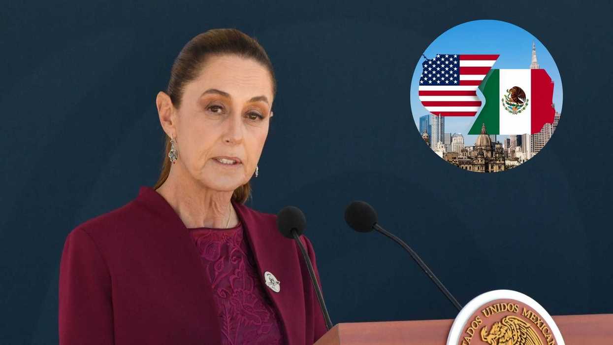 Woman speaking at podium, USA-Mexico flags and cityscape in background.